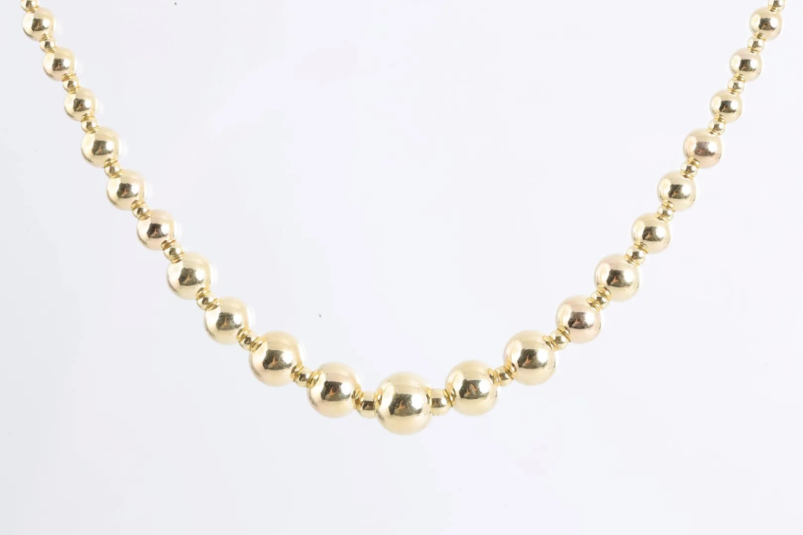 18" 14k Yellow Gold Graduated Bead Necklace (5.19g.)